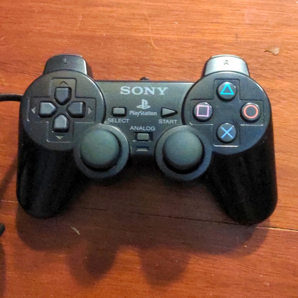 Sony Black PlayStation Wired Controller with Colored Symbols